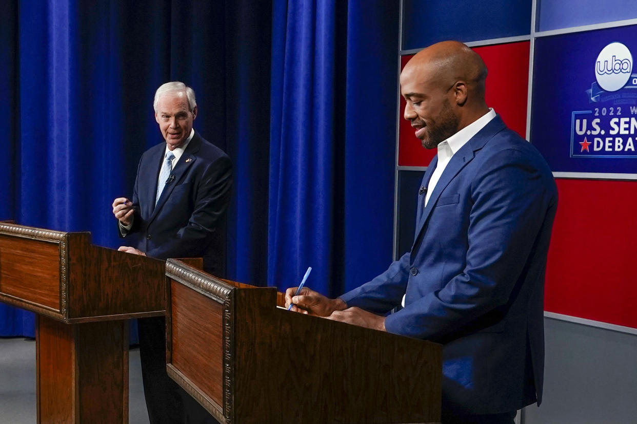Sen. Ron Johnson, left, and Democratic challenger Mandela Barnes at a televised debate Oct. 7 in Milwaukee.