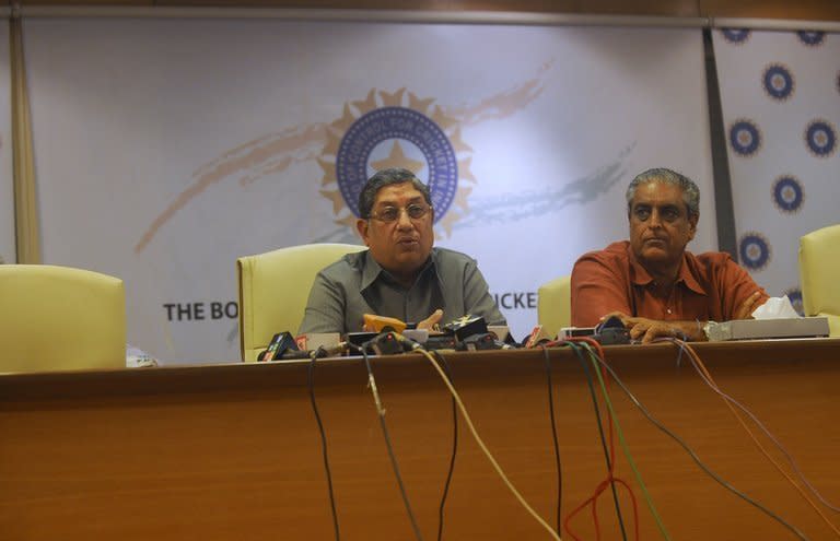 N. Srinivasan (centre) speaks at a BCCI news conference in Mumbai last September. India's cricket chief Sunday defied calls to quit over a betting scandal in the country's top domestic competition but agreed to step aside to allow an investigation to take place, the board announced