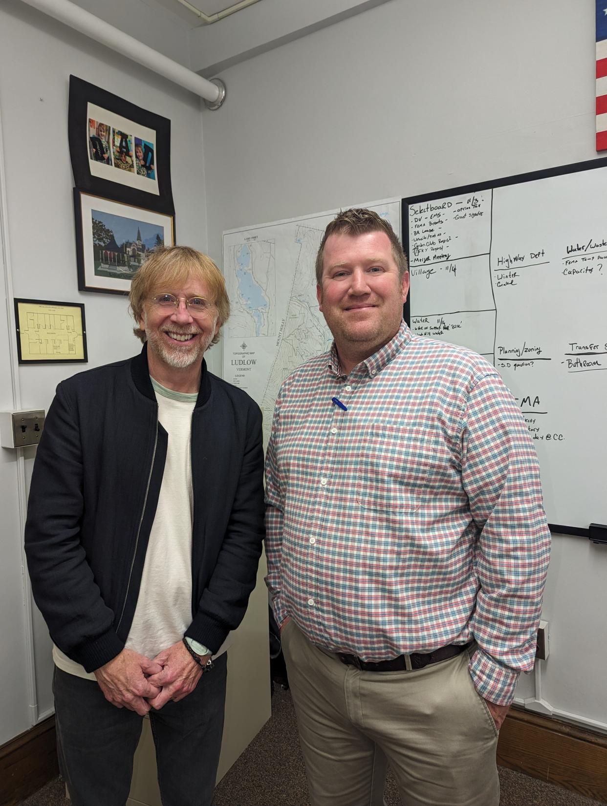 Trey Anastasio of Phish (left) stands with Brendan McNamara, municipal manager in Ludlow.