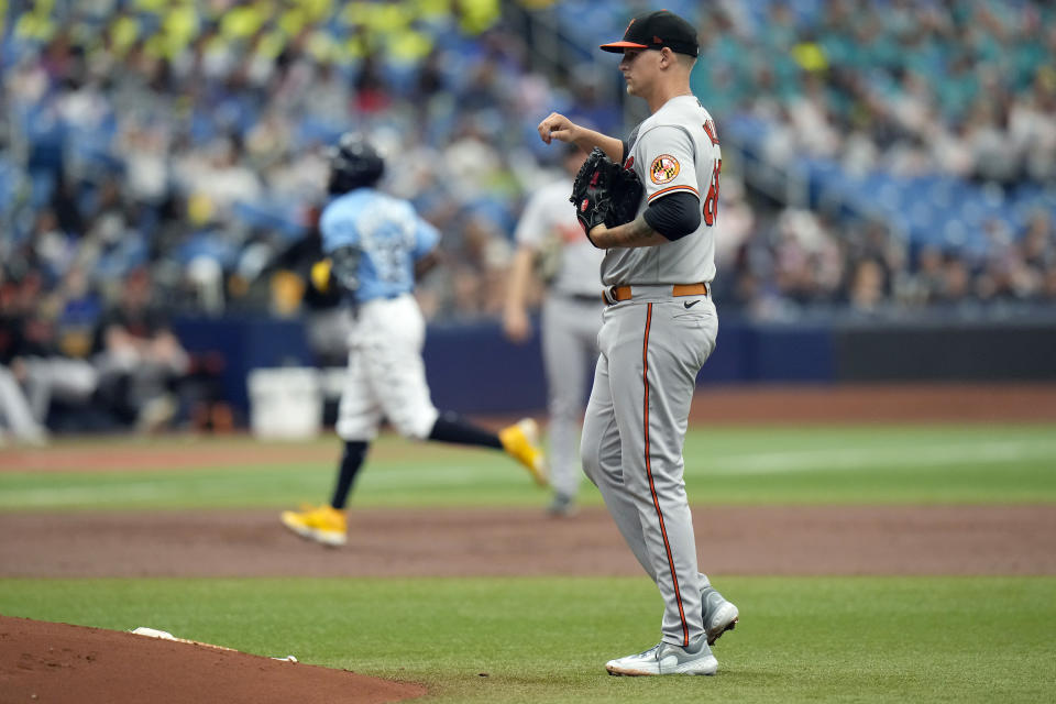 Baltimore Orioles starting pitcher Tyler Wells reacts as Tampa Bay Rays' Randy Arozarena rounds the bases after his home run during the second inning of a baseball game Wednesday, June 21, 2023, in St. Petersburg, Fla. (AP Photo/Chris O'Meara)