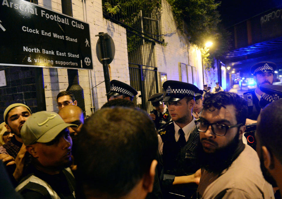 <p>Police officers talk with local people at the Finsbury Park in north London, where a vehicle struck pedestrians Monday, June 19, 2017. A vehicle struck pedestrians near a mosque in north London early Monday morning, causing several casualties, police said. (Yui Mok/PA via AP) </p>