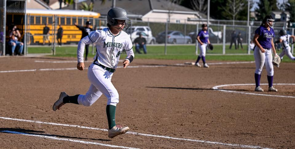 El Diamante's Ashley Espino runs to first against Mission Oak in a non-league high school softball game on Friday, March 31, 2023. 