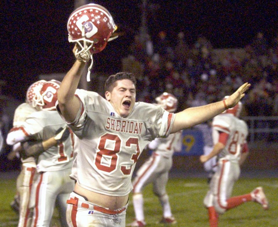 Sheridan's Nick Ridenour celebrates after the Generals held Stubenville to a three and out to all but assure a 22-18 victory in a Division III, Region 11 semifinal on Nov. 13, 2004, at Crater Stadium in Dover. The win was one of the biggest in Hall of Fame coach Paul Culver Jr.'s career and one of the state's biggest upsets that season.