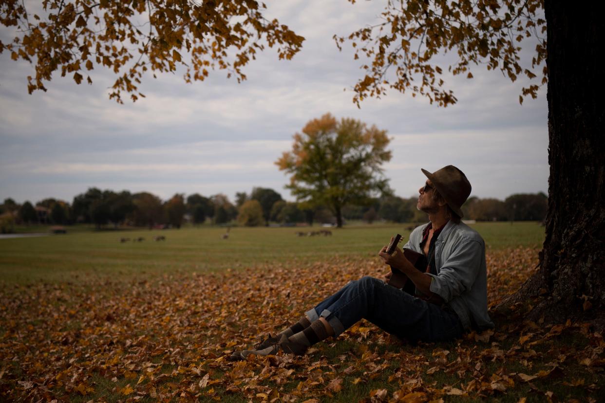 Todd Snider plays the guitar at his home in Nashville, Tenn., Tuesday, Oct. 24, 2023.