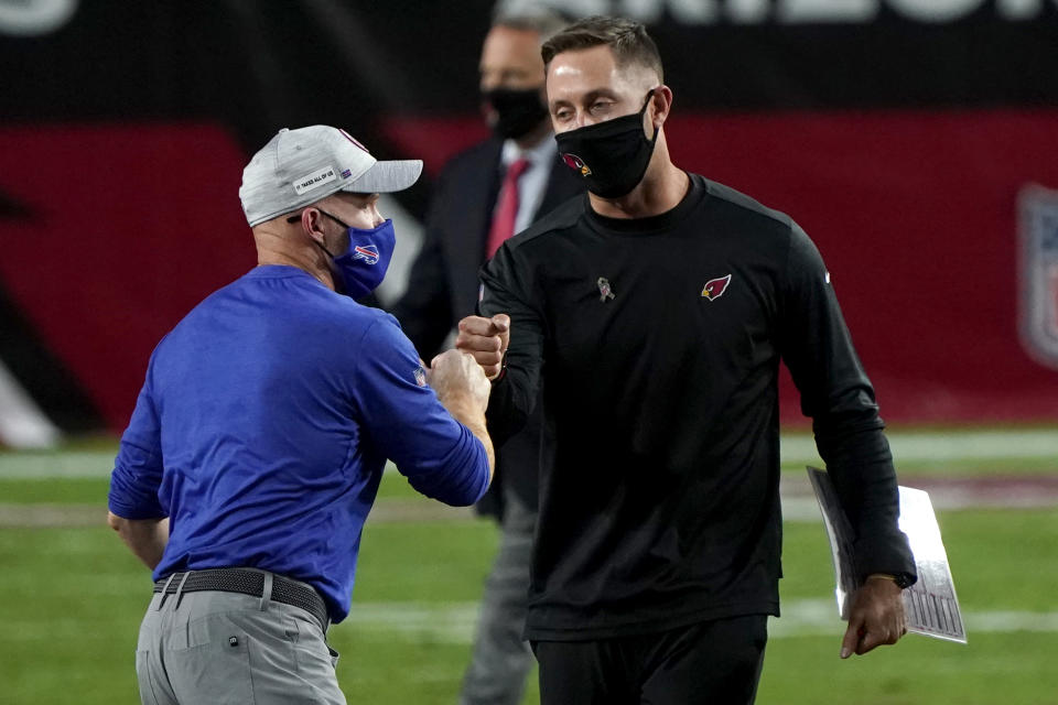 Arizona Cardinals head coach Kliff Kingsbury, right, greets Buffalo Bills head coach Sean McDermott after an NFL football game, Sunday, Nov. 15, 2020, in Glendale, Ariz. The Cardinals won 32-20. (AP Photo/Rick Scuteri)