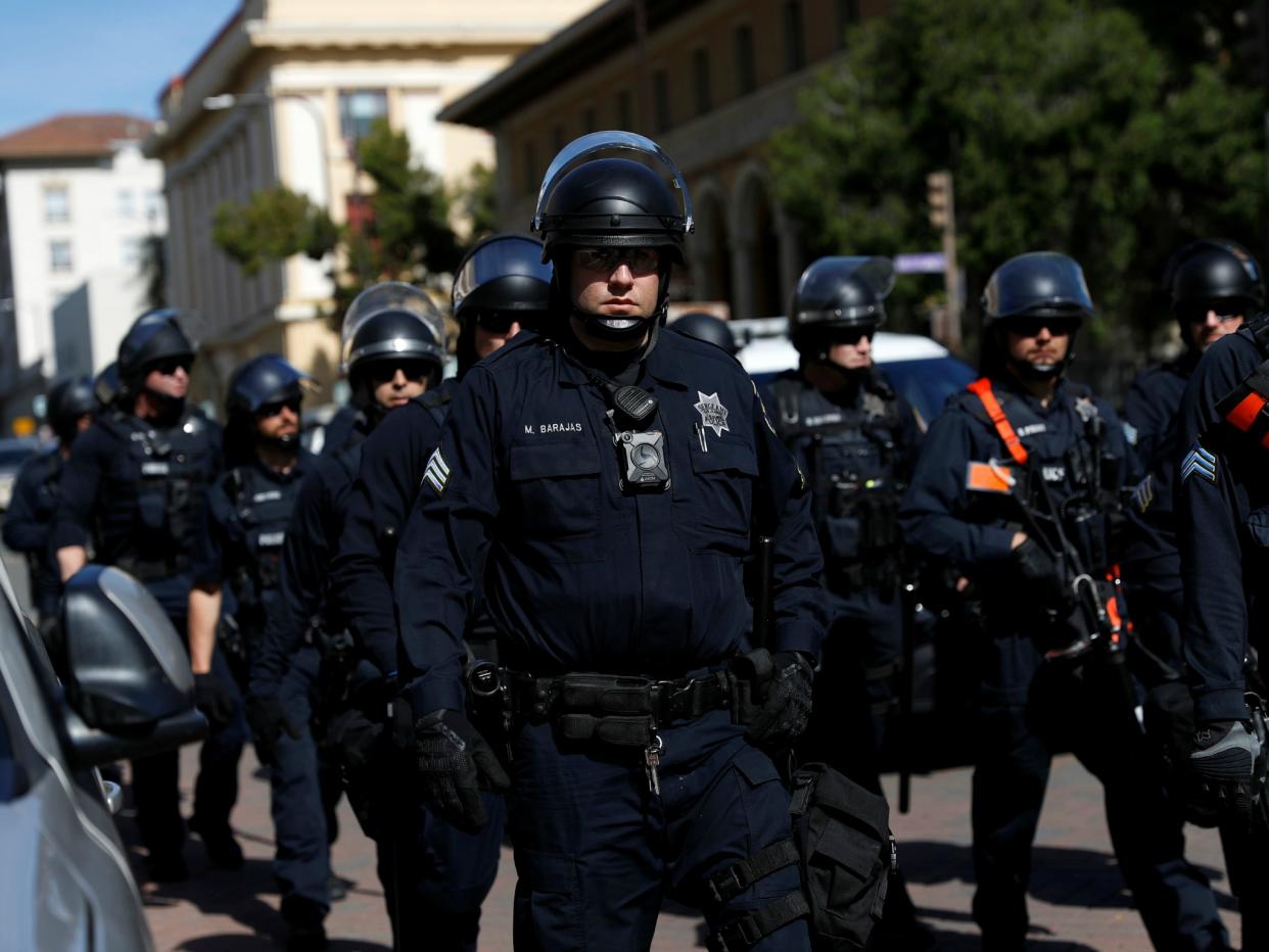 Police officers at protests over the cancellation of conservative provocateur Ann Coulter's speech in Berkeley. Police officials are bracing for violence at a 'No to Marxism in America' rally over the coming weekend: REUTERS/Stephen Lam