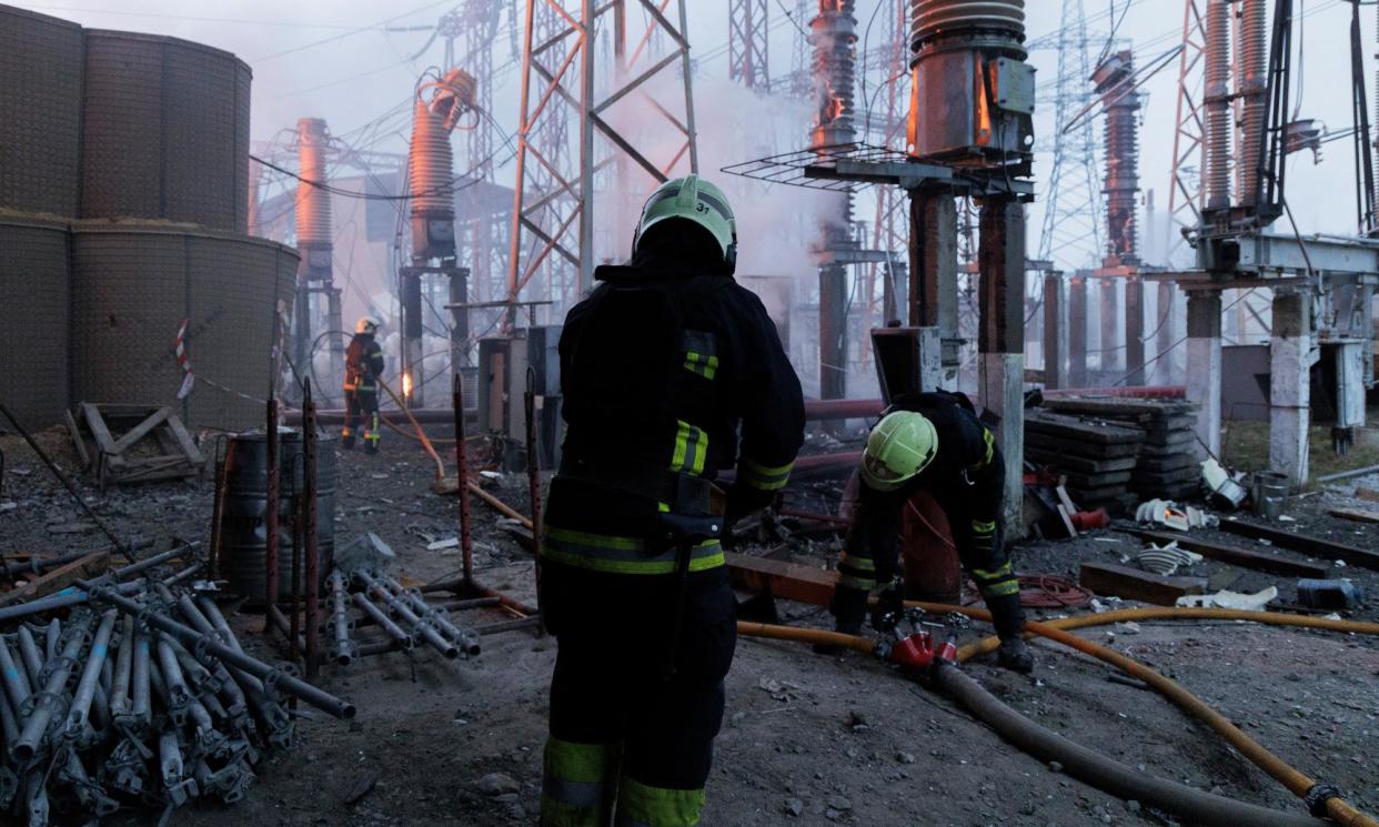 <span>Firefighters extinguish a blaze at an electricity facility after a Russian attack in Kharkiv, Ukraine, on 22 March, 2024.</span><span>Photograph: Yakiv Liashenko/AP</span>