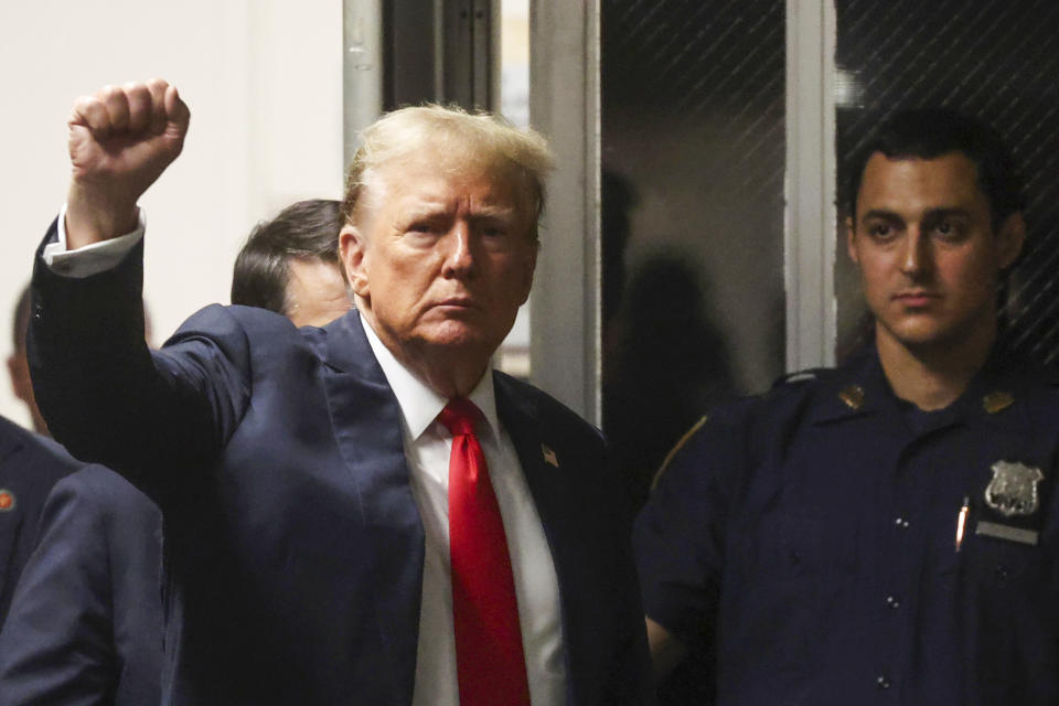 FILE - Former President Donald Trump reacts as he walks back into the courtroom after a break during closing arguments in his hush money trial at Manhattan criminal court in New York, May 28, 2024. (Spencer Platt/Pool Photo via AP)