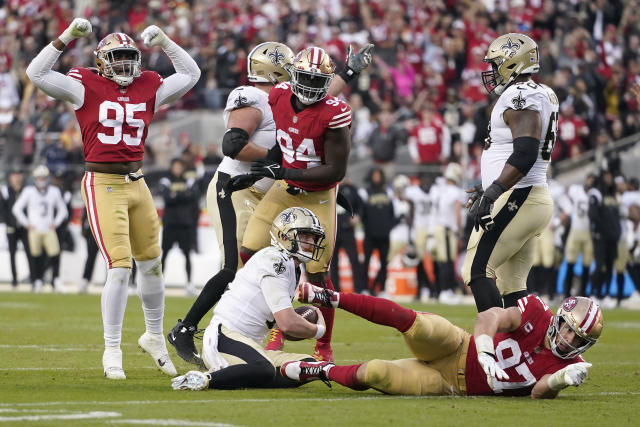 Santa Clara, United States. 04th Dec, 2022. San Francisco 49ers' Nick Bosa  (97) celebrates his sack against Miami Dolphins starting quarterback Tua  Tagovailoa (1) in the second quarter at Levi's Stadium in