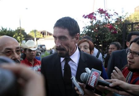 John McAfee, U.S. anti-virus software guru, addresses a news conference outside the Supreme Court of Justice in Guatemala City December 4, 2012. REUTERS/William Gularte