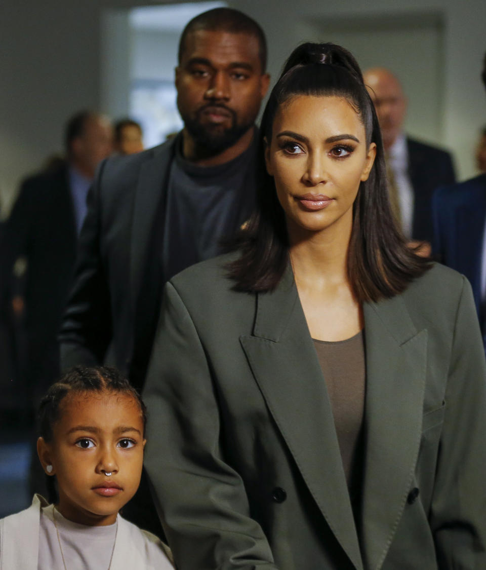 Kanye West, Kim Kardashian West, and their daughter North