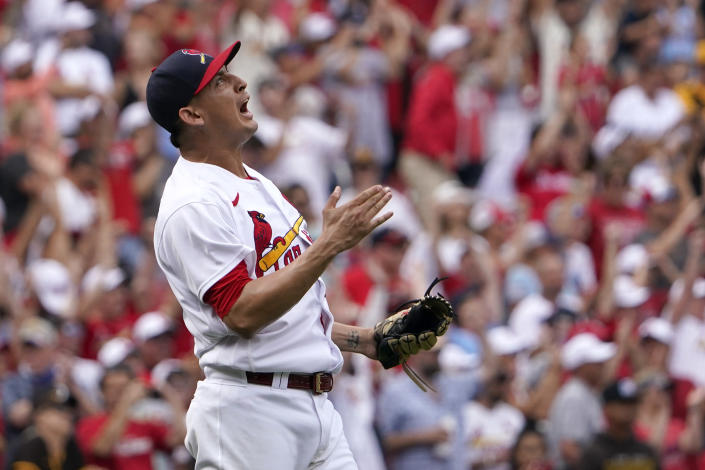 St. Louis Cardinals relief pitcher Giovanny Gallegos celebrates after getting San Diego Padres' Jake Cronenworth to fly out to end a baseball game Sunday, Sept. 19, 2021, in St. Louis. (AP Photo/Jeff Roberson)
