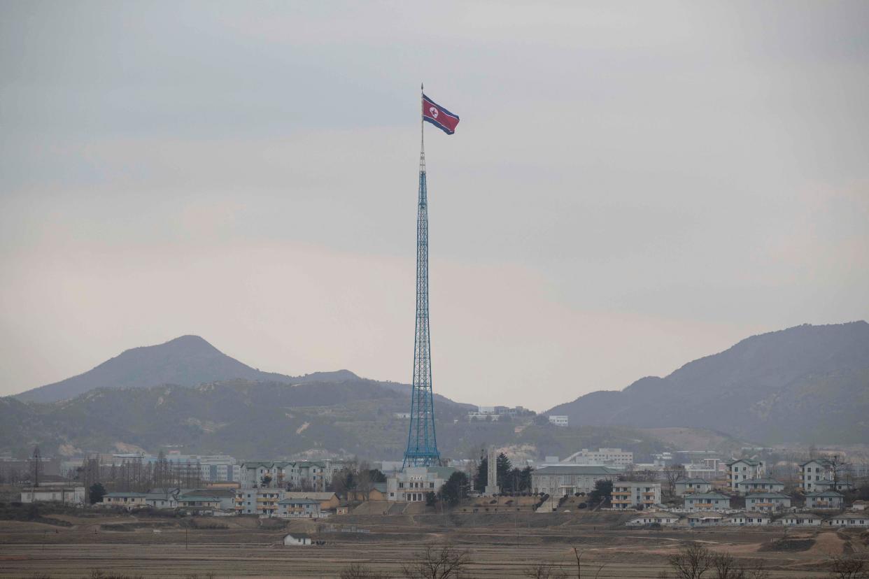 A North Korean national flag in North Korea's propaganda village of Gijungdong is seen from a South Korea's observation post inside the demilitarized zone (DMZ) separating South and North Korea on March 03, 2023 in Panmunjom, South Korea.