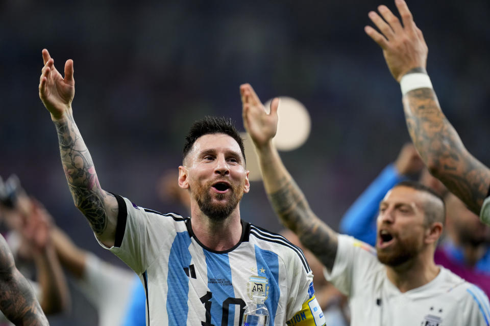 Argentina's Lionel Messi celebrates winning the World Cup round of 16 soccer match between Argentina and Australia at the Ahmad Bin Ali Stadium in Doha, Qatar, Saturday, Dec. 3, 2022. (AP Photo/Petr David Josek)