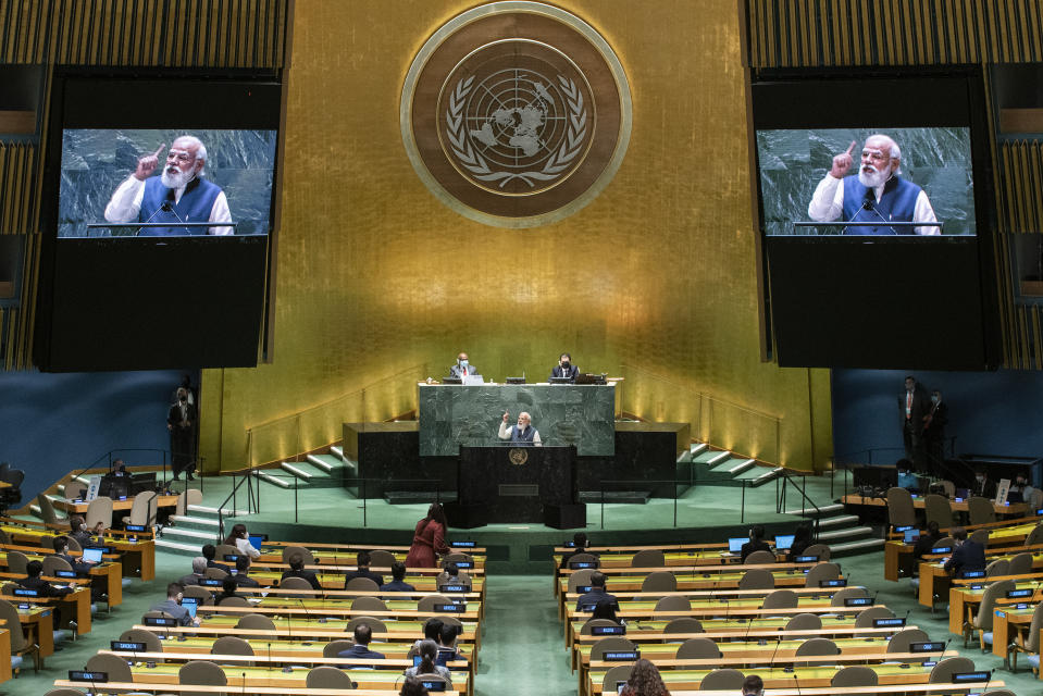 India's Prime Minister Narendra Modi addresses the 76th Session of the U.N. General Assembly at United Nations headquarters in New York, on Saturday, Sept. 25, 2021. (Eduardo Munoz /Pool Photo via AP)