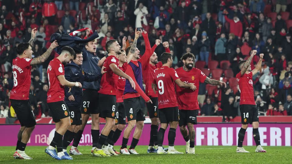 Mallorca players celebrate their win after the match. - Rafa Babot/Getty Images