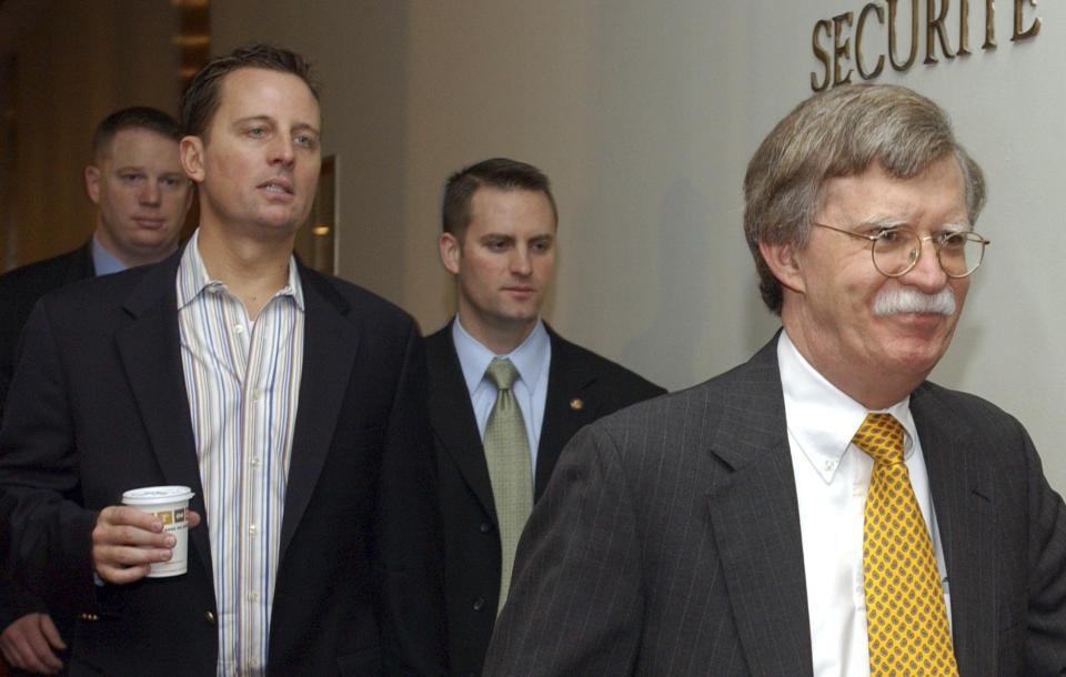 John Bolton, right, and Richard Grenell, left