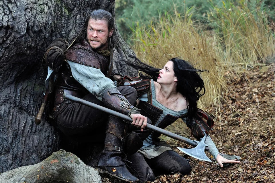 SNOW WHITE AND THE HUNTSMAN, from left: Chris Hemsworth, Kristen Stewart, 2012