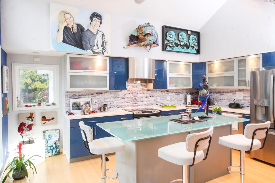 The kitchen of Larry Shapin and Ladonna Nicolas' home was inspired by a trips to Iceland. “We went to Iceland a number of times, and I wanted to (create) an Icelandic kitchen,” he said. The space boasts blues and greens, with bursts of playfulness and spontaneity — and art.