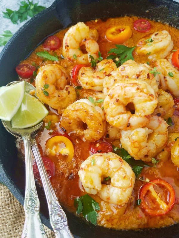 <p>Easy and Delish</p><p>Moqueca is a bright orange, spicy Brazilian seafood stew made in 30 minutes with fish, shrimp, and veggies cooked in coconut milk. One of the most flavorful dishes you’ll ever taste!</p><p><strong>Get the Recipe: <a href="https://www.easyanddelish.com/bahian-style-seafood-stew-moqueca-baiana/" rel="nofollow noopener" target="_blank" data-ylk="slk:Moqueca Baiana;elm:context_link;itc:0;sec:content-canvas" class="link ">Moqueca Baiana</a></strong></p>