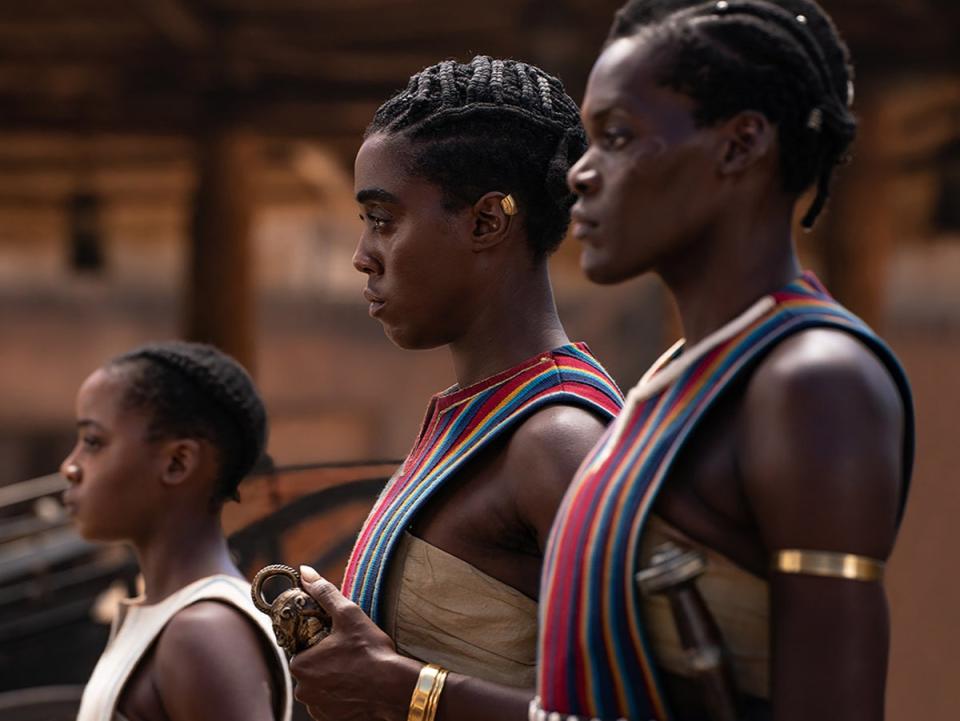 Atim (right) plays one of the many members of the Agojie, the all-women fighting force of Dahomey (Sony)