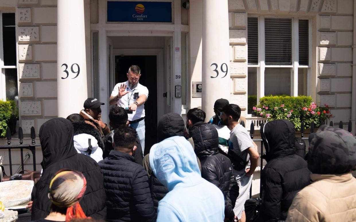 Migrant protestors returned to the Comfort Inn in Pimlico, London, on Friday night after a three-day protest - James Manning/PA