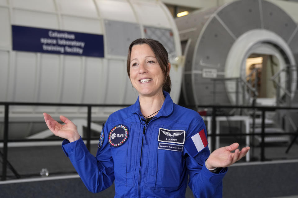 Astronaut Sophie Adenot of France talks to the Associated Press after the candidates of the Class of 2022 graduation ceremony at the European Astronaut Centre in Cologne, Germany, Monday, April 22, 2024. ESA astronaut candidates Sophie Adenot of France, Pablo Alvarez Fernandez of Spain, Rosemary Coogan of Britain, Raphael Liegeois of Belgium and Marco Sieber of Switzerland took up duty at the European Astronaut Centre one year ago to be trained to the highest level of standards as specified by the International Space Station partners. Also concluding a year of astronaut basic training is Australian astronaut candidate Katherine Bennell-Pegg, who has trained alongside ESA's candidates. (AP Photo/Martin Meissner)