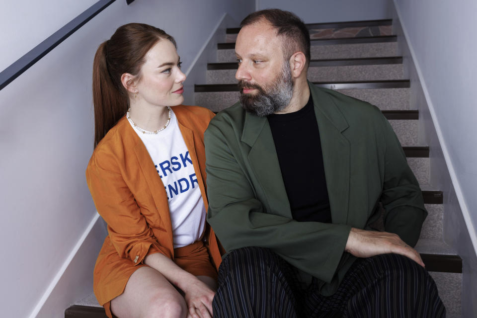 Emma Stone, left, and director Yorgos Lanthimos pose for a portrait photograph for the film 'Kinds of Kindness' at the 77th international film festival, Cannes, southern France, Saturday, May 18 2024. (Photo by Vianney Le Caer/Invision/AP)