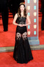 <p>“The Miniaturist” actress paired a headpiece with a lace gown by Dolce & Gabbana. </p>
