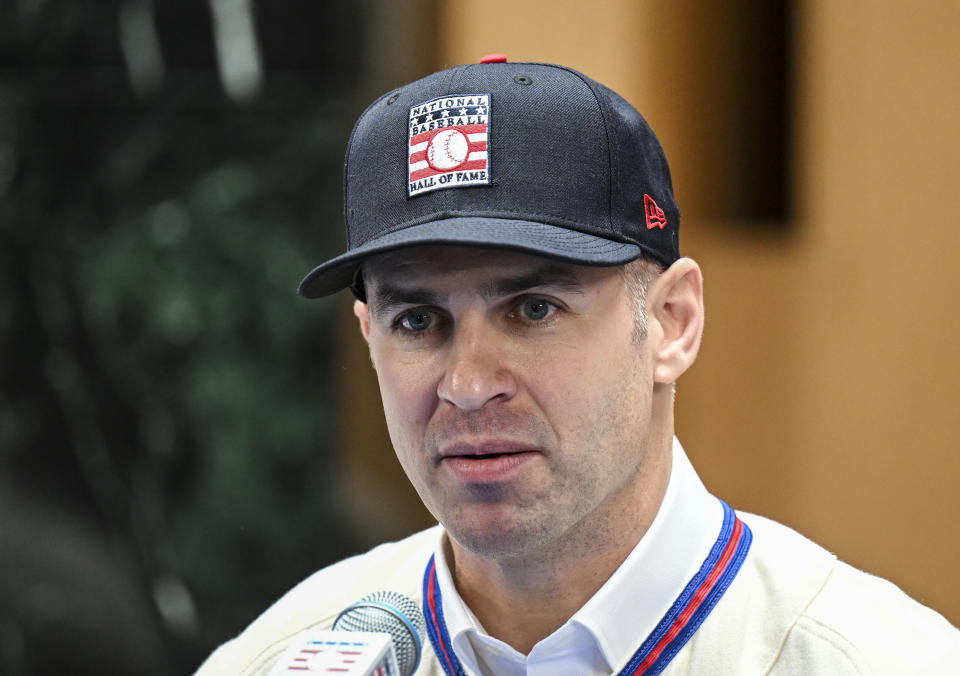 Newly elected Baseball Hall of Fame inductee Joe Mauer talks with reporters during a news conference Thursday, Jan. 25, 2024, in Cooperstown, N.Y. (AP Photo/Hans Pennink)