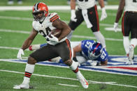 Cleveland Browns' Nick Chubb (24) rushes during the second half of an NFL football game against the New York Giants Sunday, Dec. 20, 2020, in East Rutherford, N.J. (AP Photo/Seth Wenig)