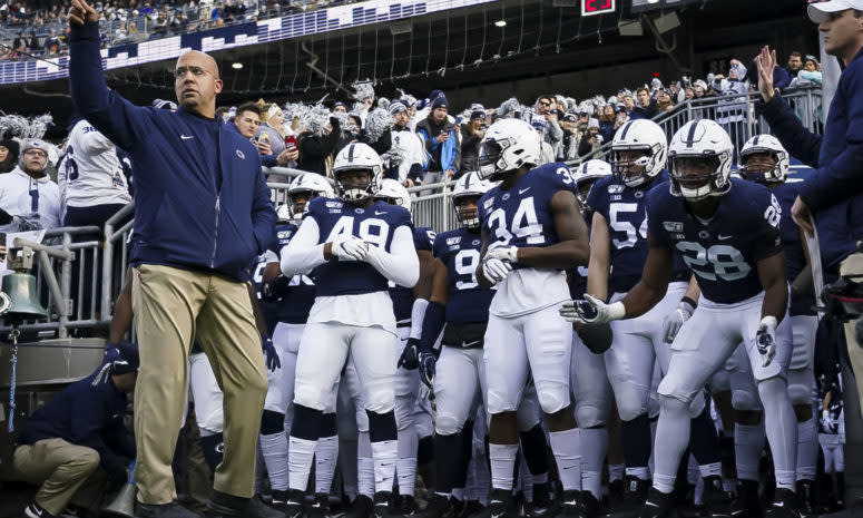 James Franklin leads Penn State out of the tunnel.