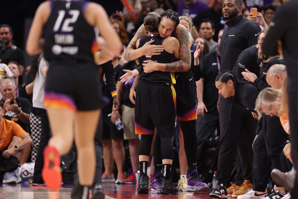 Diana Taurasi #3 of the Phoenix Mercury hugs Brittney Griner #42 after checking out of the second half of the WNBA game against the Seattle Storm at Footprint Center on Sept. 19, 2024 in Phoenix.