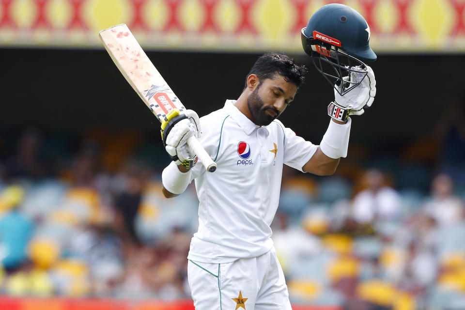 Pakistan's Babar Azam walks off the field after he lost his wicket during their cricket test match against Australia in Brisbane, Australia, Sunday, Nov. 24, 2019. (AP Photo/Tertius Pickard)