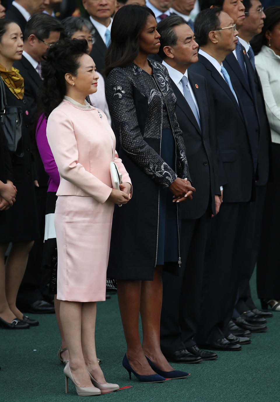 Michelle Obama in multi-textured coat on the White House’s south lawn. 