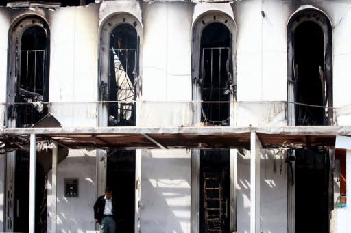 A Thai investigator works at the burnt-out Santika nightclub in Bangkok in 2009. Concerns about fire safety at Thai nightclubs were highlighted by the massive blaze at the disco in the capital Bangkok in 2009 that left more than 60 people dead, including foreigners, as people celebrated the New Year