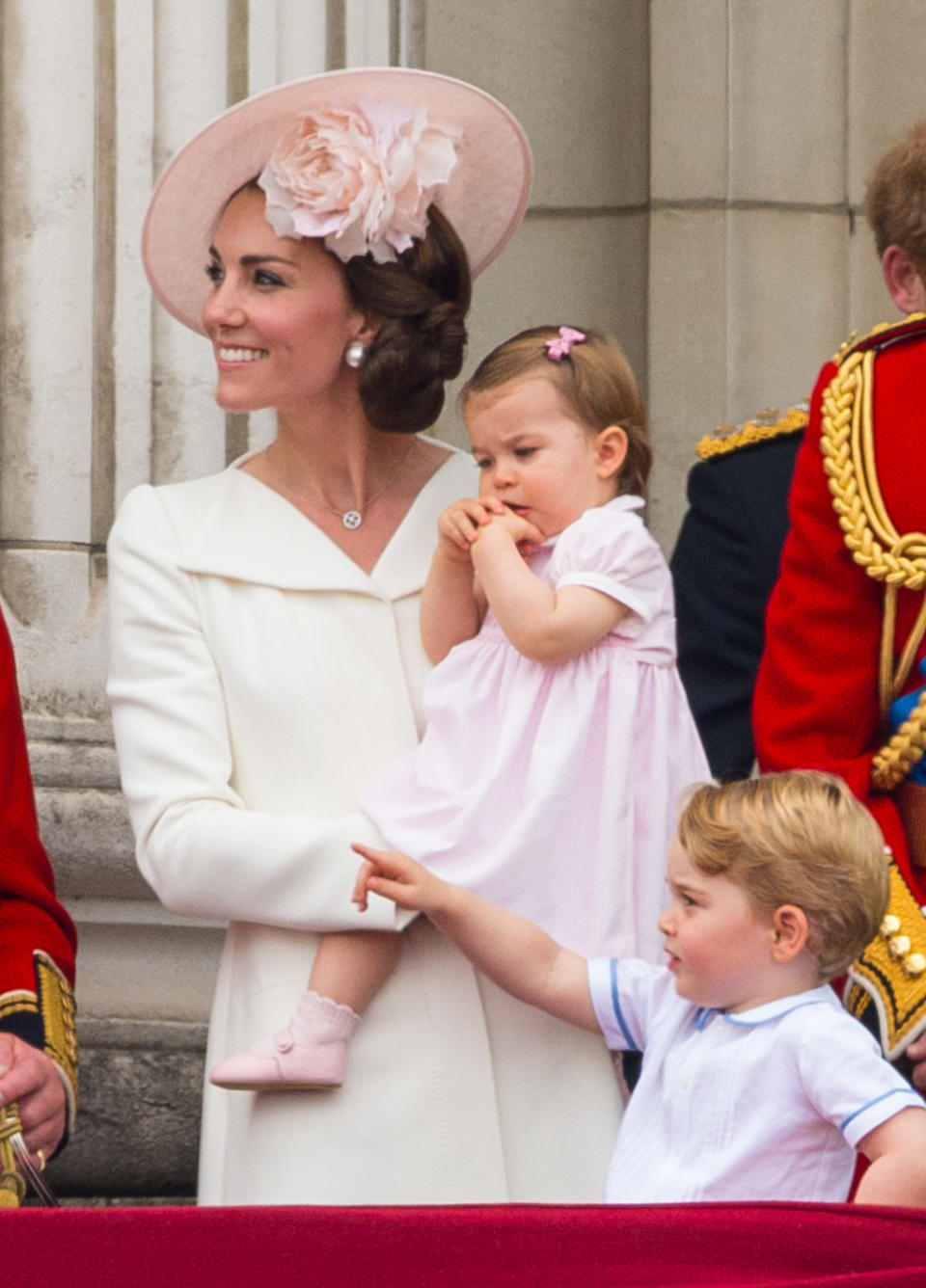<p>The Duchess recycled her Alexander McQueen outfit from Princess Charlotte’s christening for an appearance on the balcony at the Queen’s 90th birthday celebration. A pale pink hat by Philip Treacy and pearl Balenciaga earrings completed the look. </p><p><i>[Photo: PA]</i></p>