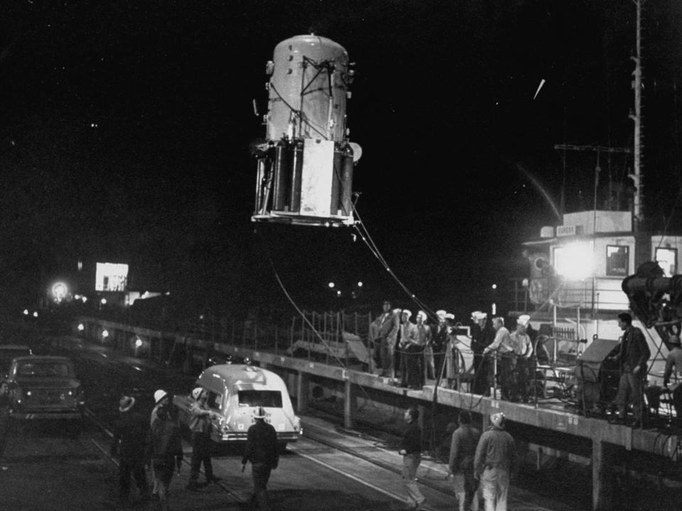 Atlantis being lifted out of water after record-breaking 1000 ft. dive.