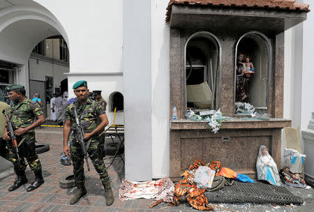 Sri Lankan military officials stand guard in front of the St. Anthony's Shrine, Kochchikade church after an explosion in Colombo, Sri Lanka April 21, 2019. REUTERS/Dinuka Liyanawatte