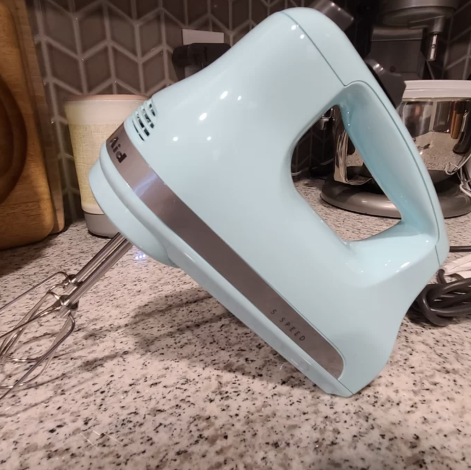 the light blue hand mixer