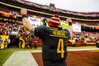 Washington Commanders quarterback Taylor Heinicke (4) celebrates after a NFL football game between the Atlanta Falcons and the Washington Commanders on Sunday, Nov. 27, 2022 at FedExField in Landover, Md. (Shaban Athuman/Richmond Times-Dispatch via AP)