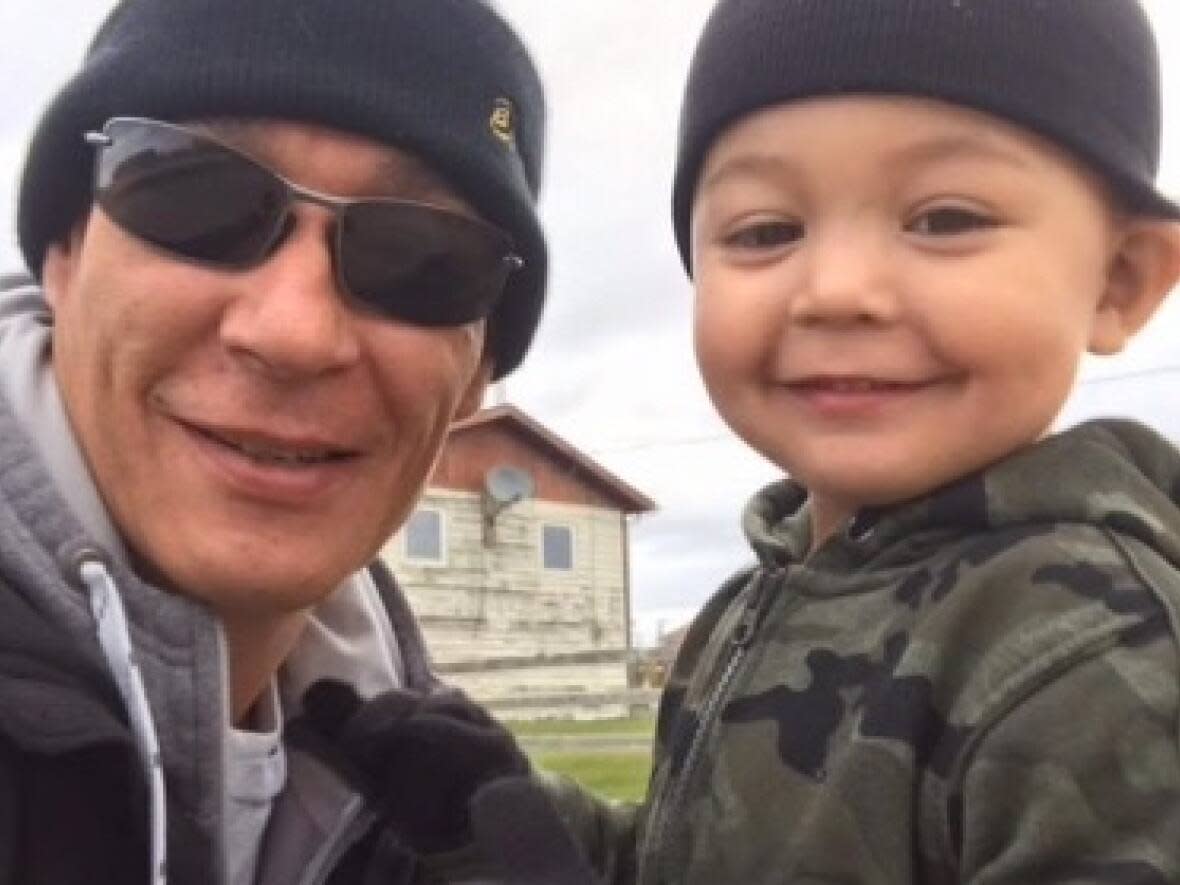 Luc Macaulay and his 5-year-old son. On Dec. 22, the family's home in Fort Simpson, N.W.T., burned down along with their Christmas tree and gifts. (Luc Macaulay - image credit)