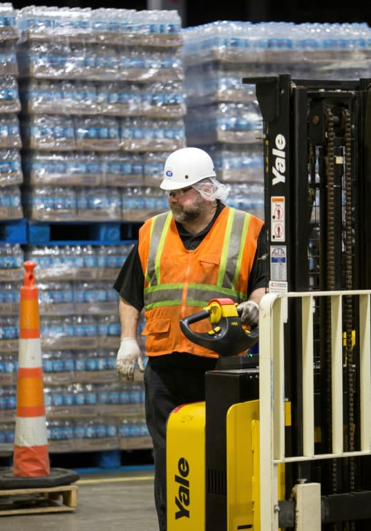 Demand for bottled water, such as these stacks at Nestle's facility in Stanwood, Michigan, is rising