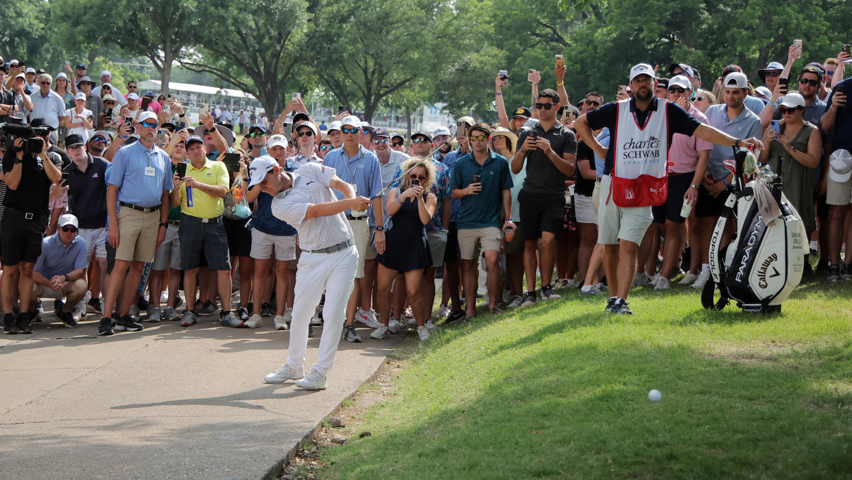  Emiliano Grillo of Argentina hits shot on the 18th hole from the cartpath during the final round of the Charles Schwab Challenge at Colonial Country Club 