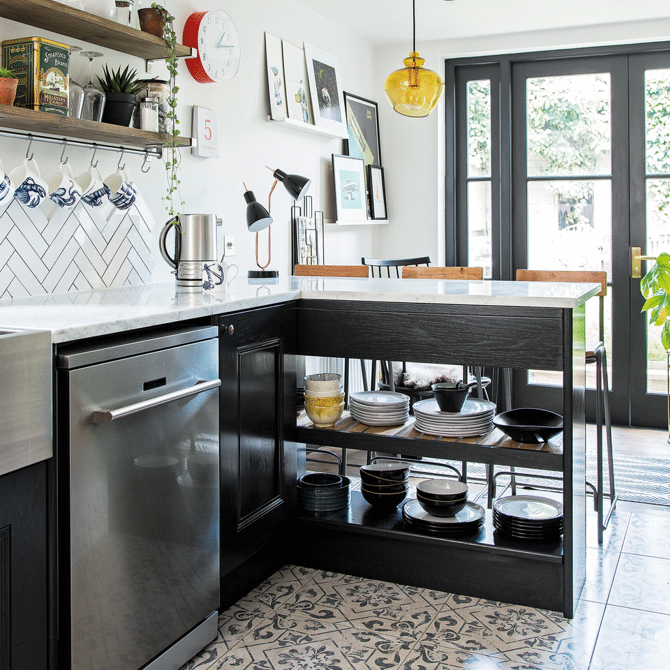 Blue cabinets with dishwasher in kitchen