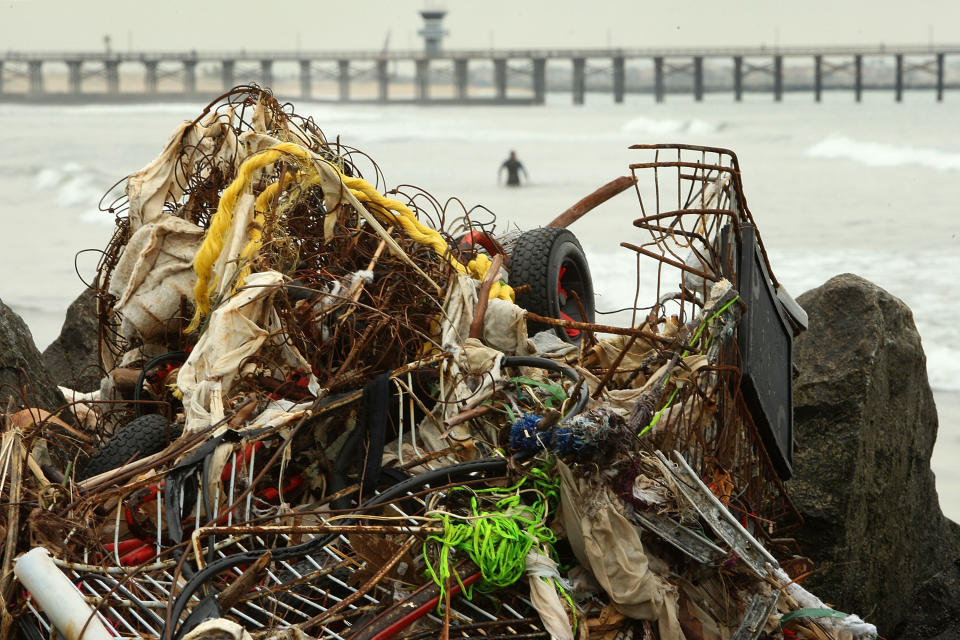 <p>Trash and debris from previous storms accumulate in Seal Beach, California, near the mouth of the San Gabriel River, on Jan. 26, 2010.</p>