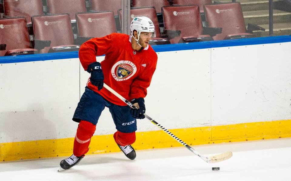 Florida Panthers center Alex Wennberg (21) drives down the ice with the puck during the first practice of training camp in preparation for the 2020-21 NHL season at the BB&T Center on Monday, January 4, 2021 in Sunrise.