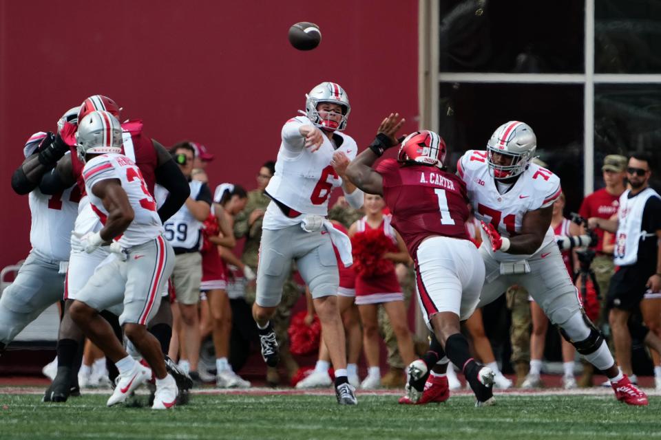 Ohio State quarterback Kyle McCord completed 20 of 33 passes for 239 yards and an interception against Indiana on Saturday.