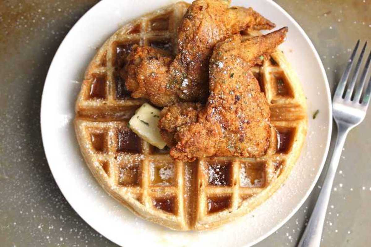 <p>Grandbaby Cakes</p><p>Get ready for this perfect Chicken and Waffles Recipe. Imagine perfectly seasoned and crispy fried chicken on top of a fluffy, sweet and tender waffle!</p><p><strong>Get the recipe: <a href="https://grandbaby-cakes.com/chicken-and-waffles-recipe/" rel="nofollow noopener" target="_blank" data-ylk="slk:Homemade Chicken and Waffles Recipe;elm:context_link;itc:0;sec:content-canvas" class="link rapid-noclick-resp">Homemade Chicken and Waffles Recipe</a></strong></p>