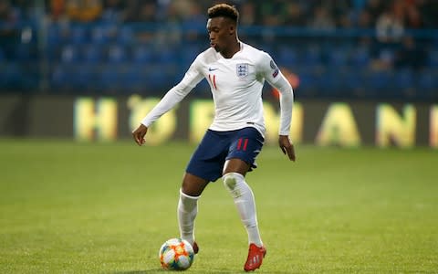 England's Callum Hudson-Odoi dribbles with the ball in his first match for the team during the Euro 2020 group A qualifying soccer match between Montenegro and England - Credit: AP